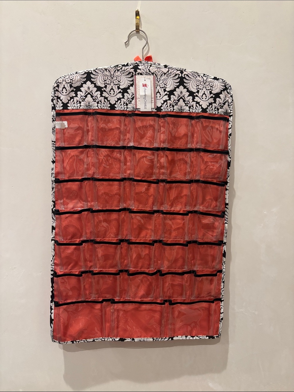 Charming Charlie 66-Pocket Hanging Organizer in Red and Black